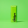 A green tin containing 100mg of edible THC gummies.